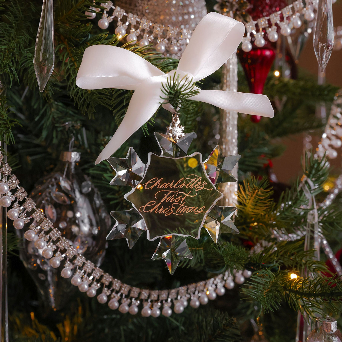 Baby's first Christmas crystal snowflake ornament engraved with Charlotte's First Christmas