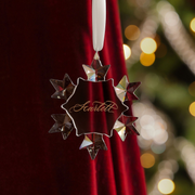 Personalised crystal snowflake Christmas bauble hand-engraved with a name in gold calligraphy