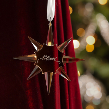 Gold crystal star Christmas ornament engraved with the name Olivia