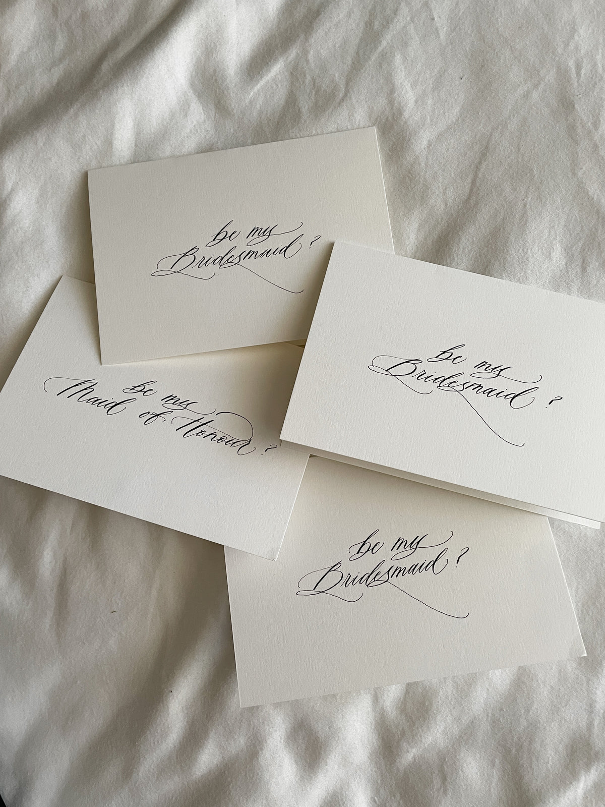 Black ink, handwritten calligraphy Be my Bridesmaid and Maid of Honour proposal cards