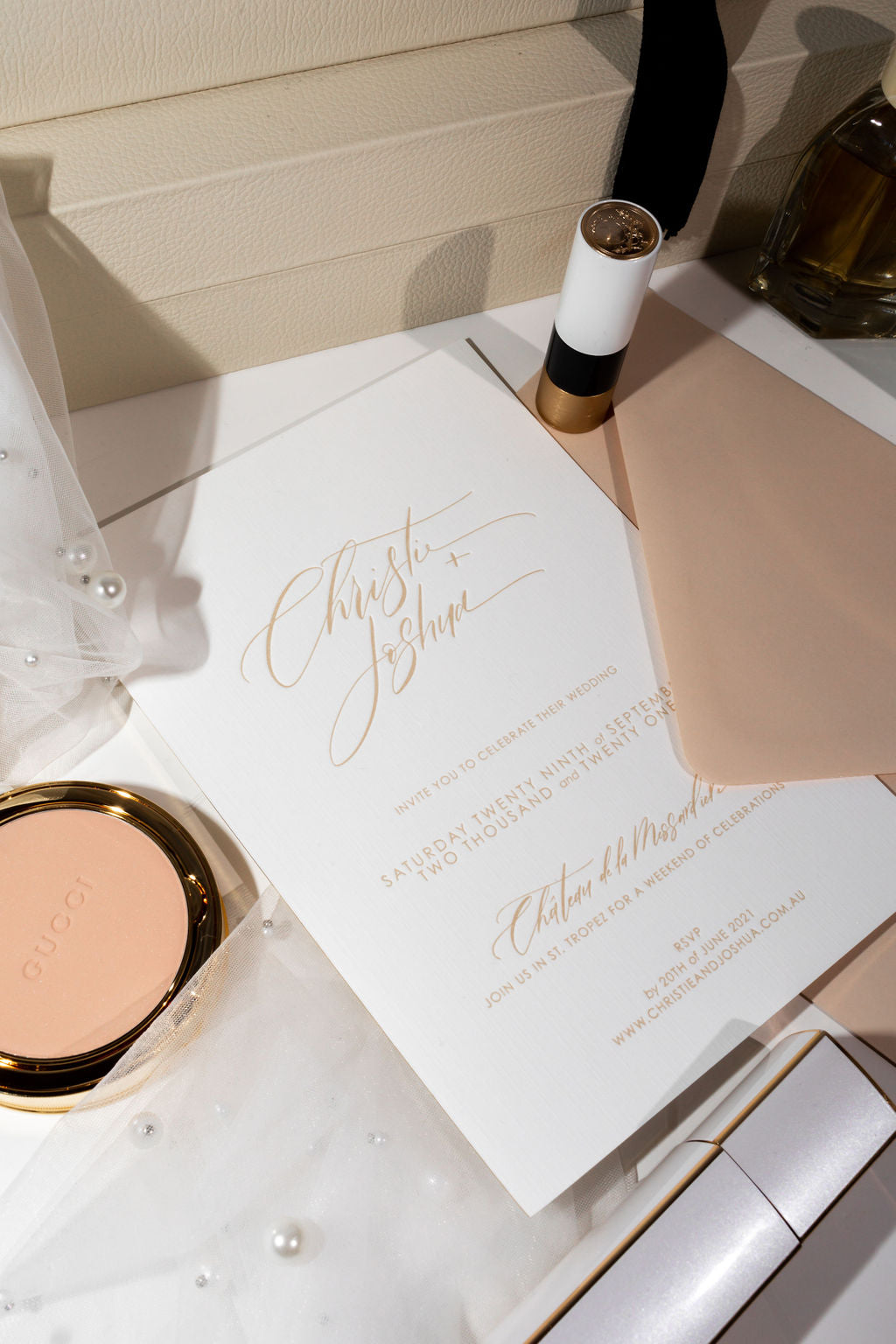 Calligraphy name design for wedding stationery with a blush envelope
